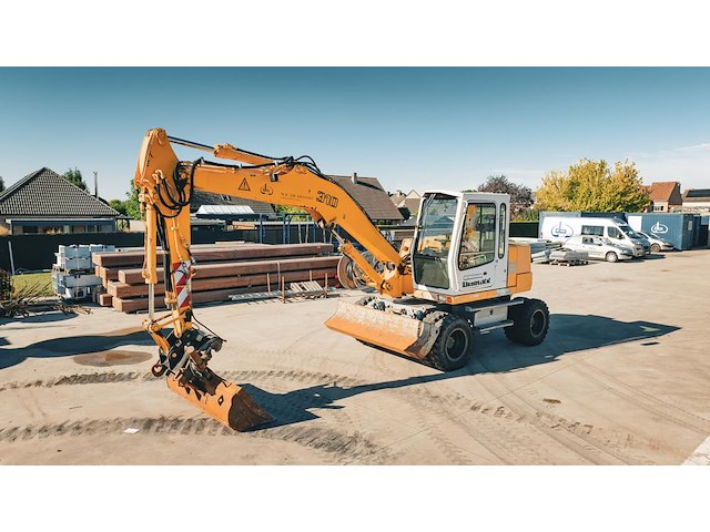 2001 liebherr a310b bandengraafmachine - afbeelding 1 van  33